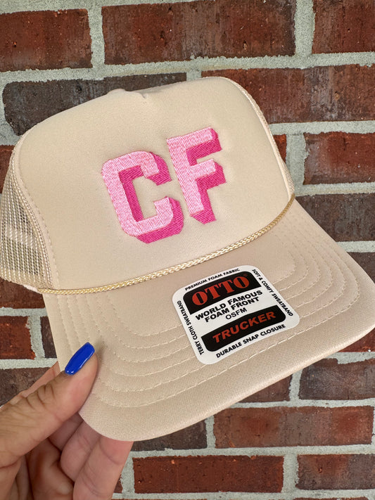 Cream + pink initial trucker